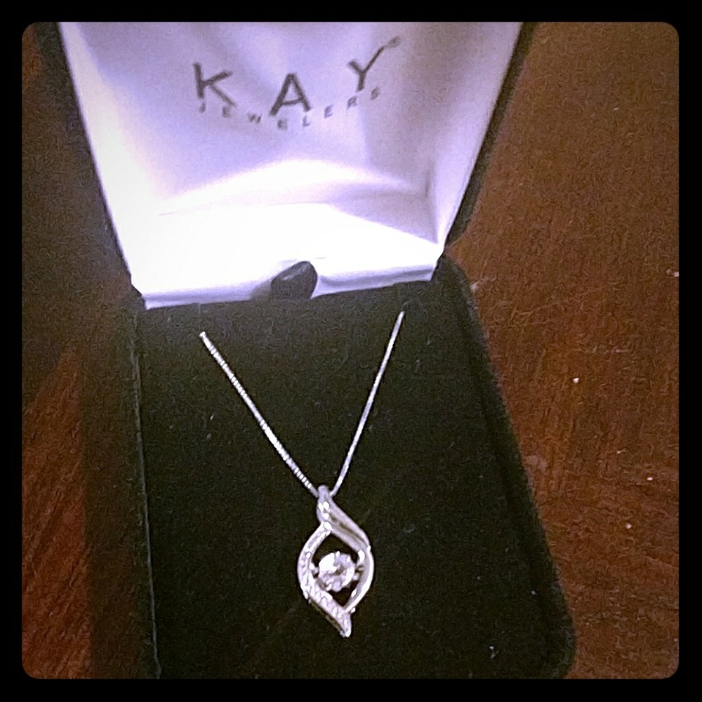 Sterling silver necklace with diamonds.